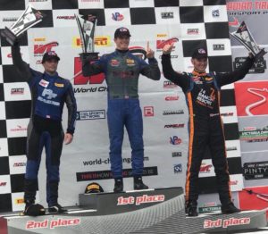 Lawson Aschenbach and Jade Buford on the Pirelli World Challenge GTS Podium at Canadian Tire Motorsport Park