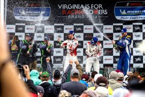 Marcelli and Stacy on the podium at VIR