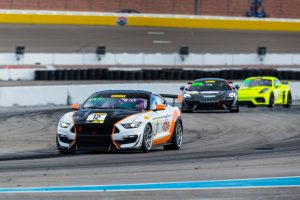 Drew Stavely in the #12 Ian Lacy Racing Ford Mustang on his way to victory and the 2019 class championship 