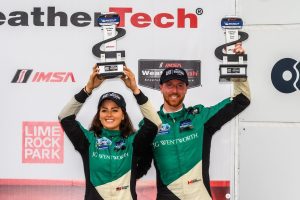 Sheena Monk and Kyle Marcelli on the IMSA Michelin Pilot Challenge Lime Rock GS Podium